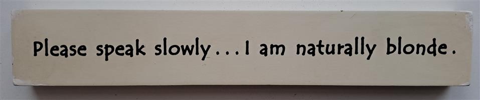 Wooden sign:"Please speak slowly... I am naturally blonde." R350.
