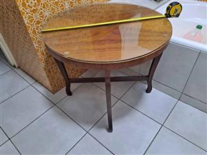 Coffee table wood with glass top still in good condition