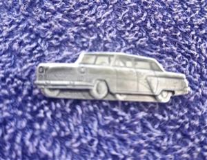 Collectible pin of a GAZ-13 Chaika car. Luxury Soviet automobile for high ranking officials