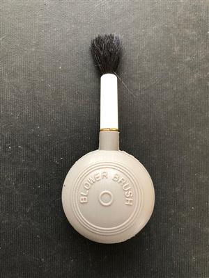 Blower brush to keep your lens dust free