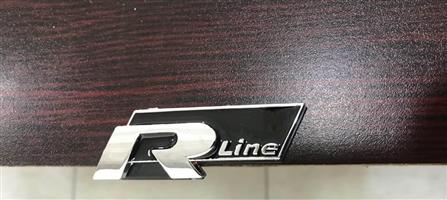 R line grill badge