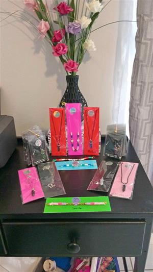 VARIETY OF NECKLACES AND BRACELETS
