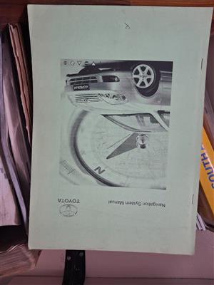 Corolla, older model, mechanical book