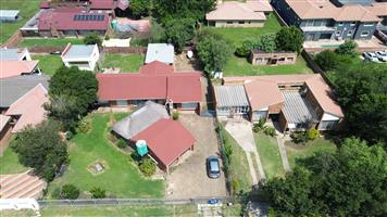 Own a charming, income-generating property in the heart of Leslie!