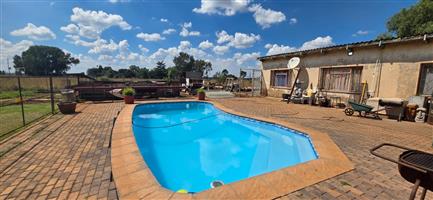 Expansive 2.14 Hectare Plot – Comfort, Space & Self-Sustainable Living