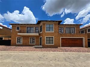 Discover Unparalleled Elegance in Three s Stunning Face Brick Cluster Home with Double garage in so