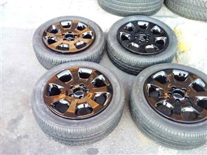 Set of 16 inch Mercedes Benz mags with almost new tyres
