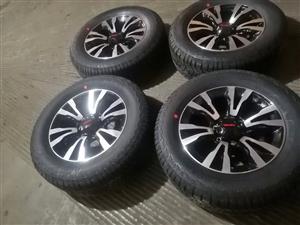 18" Isuzu X-Rider original mags with brand new 265/60/18 Hankook DynaPro AT/M set 