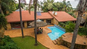 A multi-dwelling home with for 4 families within the Pamin Road  Community enclosure