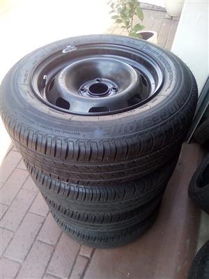 2xBrand new rims & tyres 195/65/15 Bridgestone 4/100pcd 
