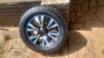 18" Isuzu X-Rider original mag with brand new General Grabber AT3 to use for spa