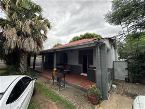 4 bedroom house with 4 flatlets for sale.