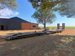 2020 34ton SA truck bodies triaxle lowbed trailer, (+Vat), standing in Bloemfontein. Call Jay