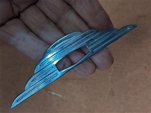 Crome badge, older car