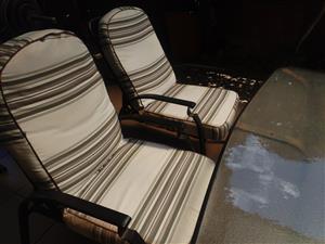 Patio set with glass table and 4 reclining chairs