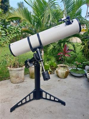 Meade 8 Inch refractor telescope with tracking.