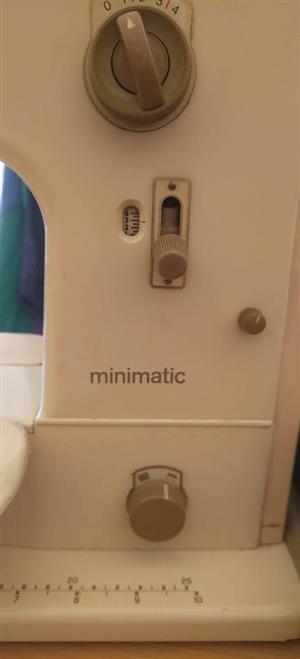 Vintage.. Original Swiss-made Bernina Minimatic portable sewing machine in its original carry case.
