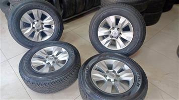 17inch TOYOTA HILUX GD6 original mags with 265/65/17 Dunlop Grandtrek A/T FAIRLY NEW set