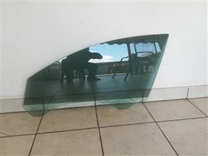 Volvo S40 left front door glass original
