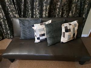 Black Faux-leather futon/sleeper couch 