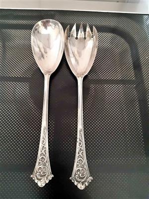 pair of vintage Ercuis silver-plated salad servers is in the ornate "Du Barry" pattern. 