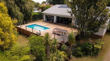 Versatile Family Home with Two Flatlets, Solar Power & Exceptional Outdoor Living in Mountain Homes,