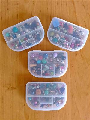 Beautiful Handmade Charms In Clear Storage Containers For Sale 