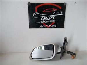 VW Polo Bujwa '07 left mirror (Electric)