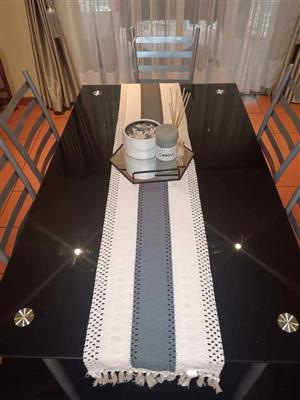 Dining room glass top set with 5 chairs and glittery glass top