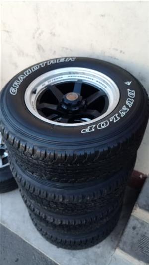 17inch Mags with 265/65/17 Dunlop A/T 85% left on thetyres, (6x139,7pcd) will fit on Ford