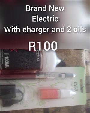 Electric Sigarette (with charger and 2 oils)