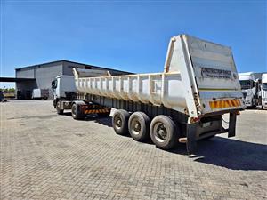 Top trailer back tipper