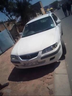 Mazda 626 fs engine model 2000
