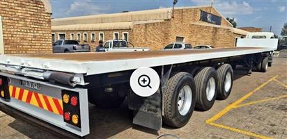 2007 HENRED FRAUHAUF TRI AXLE FLATDECK,  15M