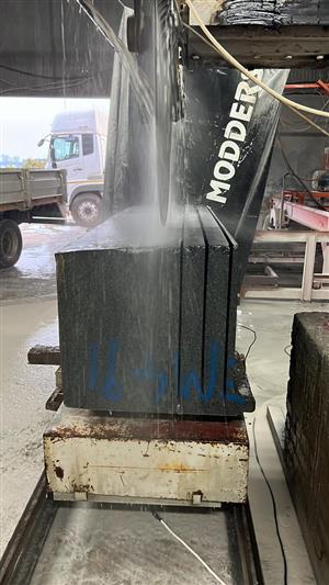 Granite Industrial machinery. Polisher and granite block saw. 