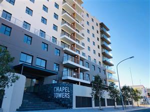 Chapel Towers: Your Modern 2-Bedroom Oasis with an Expansive Terrace Awaits!