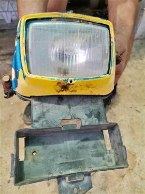 Suzuki DR 200 headlight. Meyerton bike scrapyard new and secondhand spares.