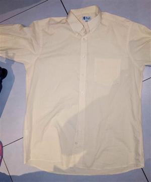 Men's Pringle short sleeve shirt. NEW. Large .