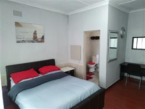 Large spacious furnished room and en suite bathroom and shower in a commune 
