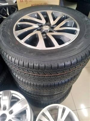 18" Nissan Navara original mags with brand new 255/60/18 Toyo Open Country 