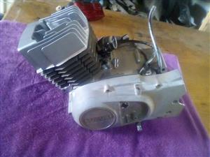 suzuki ax100 two stroke moter