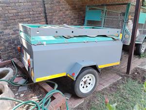 2m luggage trailer, with papers, needs paint and hinges
