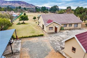 Exclusive Mandate – Beautiful 1.6 ha Smallholding near Rustenburg with Two Homes and Mountain Views