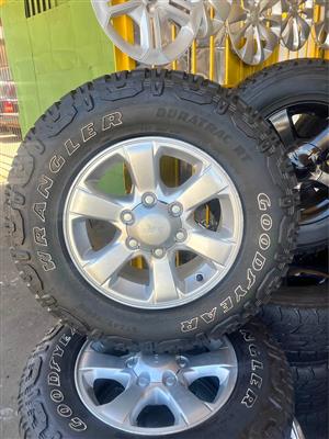 Isuzu 176 Mag Rims (WITH USED TYRES)