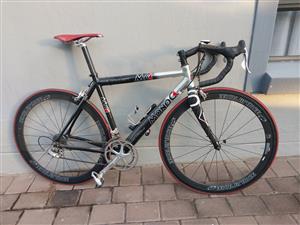Daccordi. Carbon fork. Carbon wheels. Medium. 9 speed. Veloce. Record crank