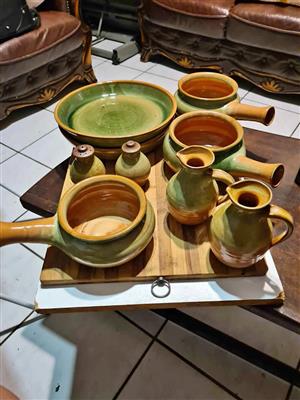 Exclusive hand made platter plates, bowls, soup or sauce bowls,  pitchers and salt and pepper