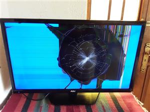 AIM 32" HD Ready LED TV.  The screen has cracks. Rest is working. So selling as is or for spares. 