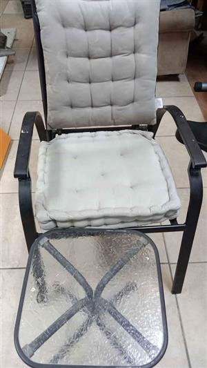 Steel stackable chair with a small table