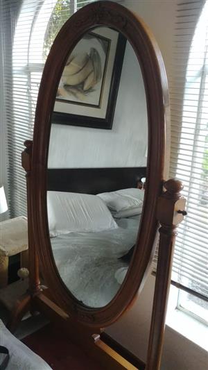 Chovel mirror full length and comes from Egypt, hand graphed. Dark wood 