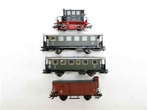H0‑scale mixed passenger and freight train set with digital steam‑loco, two coaches and one goods wa